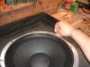 Refit the screws securing the spaeaker